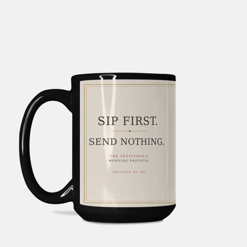 Protocol No. 001 Black Issue 15 oz ceramic mug with black handle displaying “Sip First. Send Nothing.”